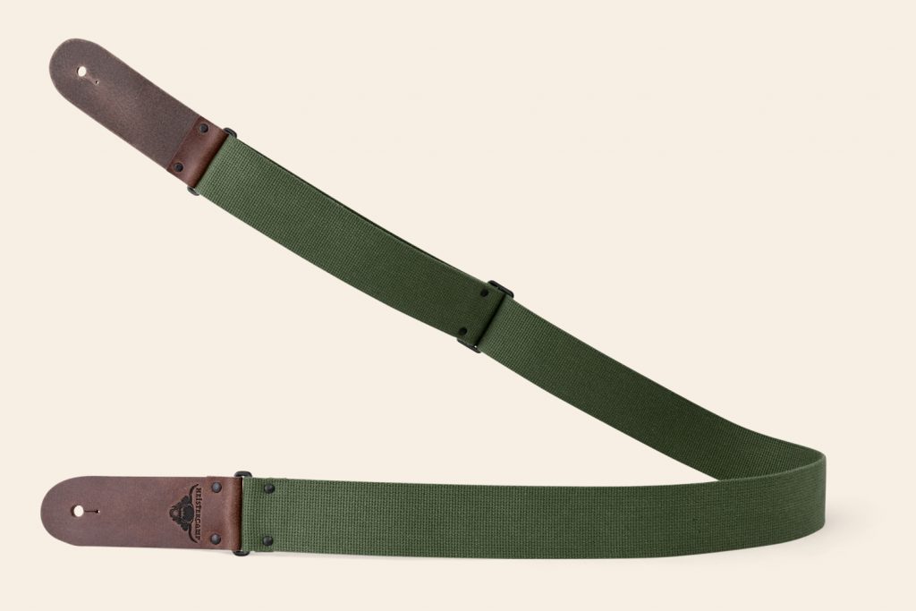 Green Webbing guitar strap with Brown Pull Up leather ends