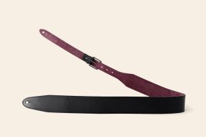 Bee Tor guitar strap in black Super Soft leather with burgundy suede lining and antique silver buckle