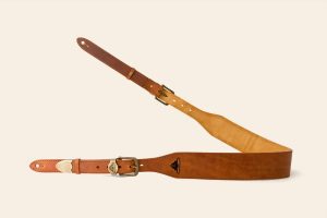Kings Tor guitar strap in tan pull up leather with ochre suede lining and antique brass metalware