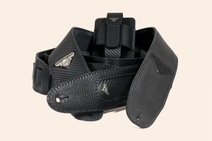 Picture of the whole collection of carbon guitar straps and transmitter pouch